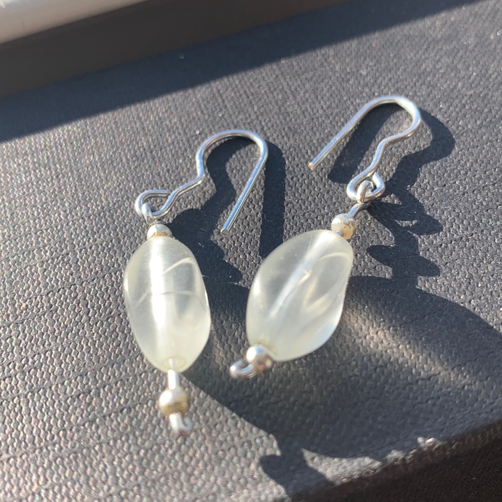 Beautiful dangle earrings with glass bead